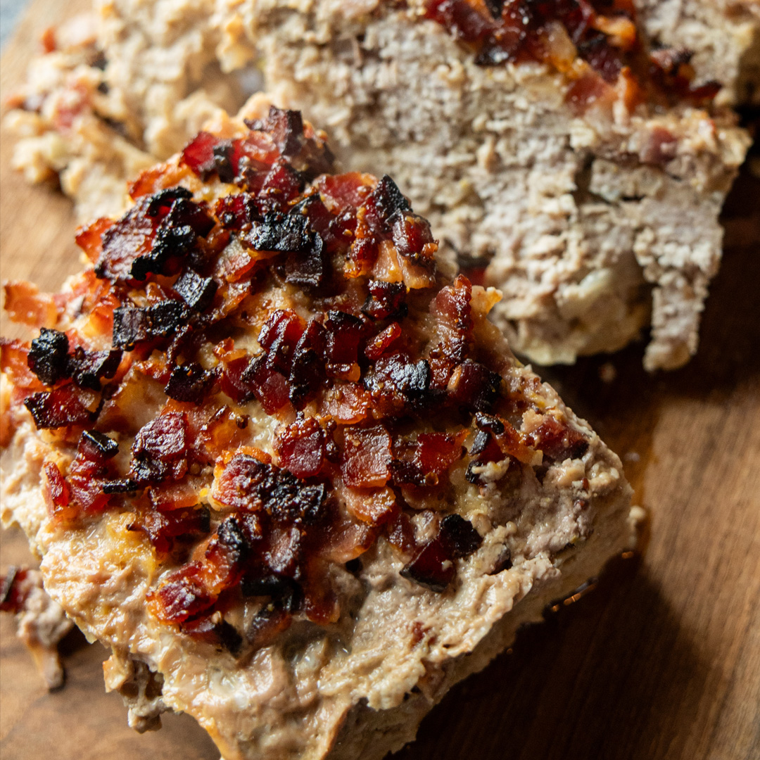 close up of maple bacon glazed meatloaf slices